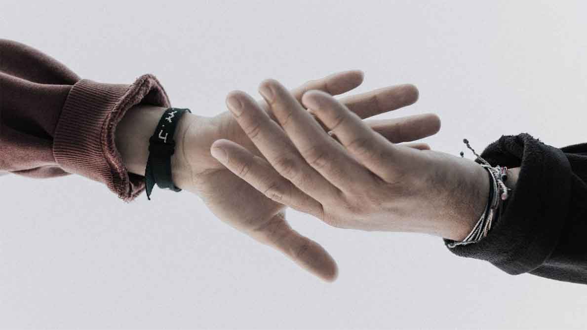 A photo of two holding hands